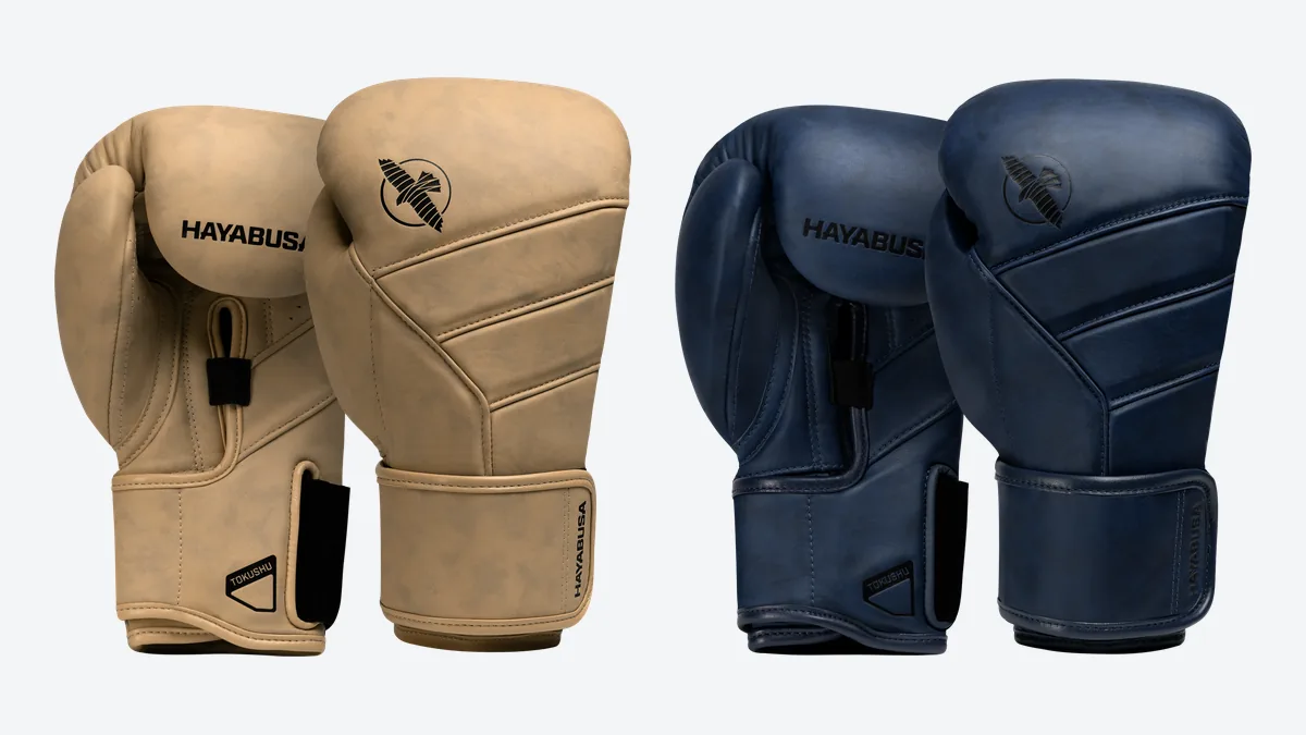 Hayabusa T3 LX boxing gloves in beige and blue showing the dual-X wrist closure